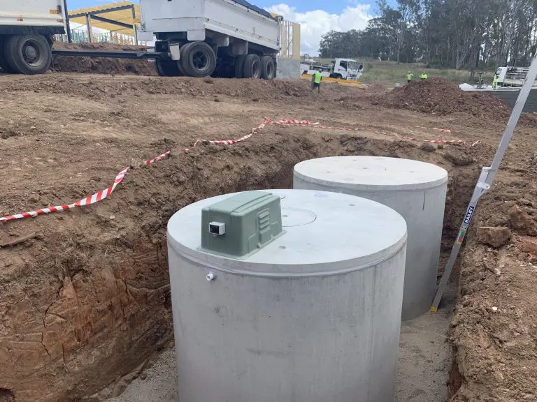 maxi series commercial 2 concrete tanks installed in a hole